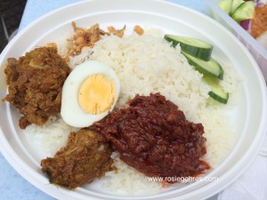 Nasi Lemak- coconut rice, egg, sambal, peanut and anchovies,cucumber,chicken rendang